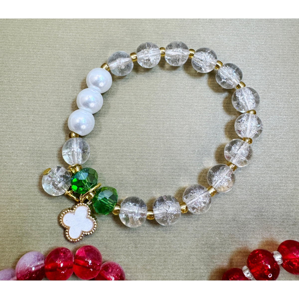 Set of 3 Stretch Bead Bracelets Butterfly Clover Acorn Charms  Description: